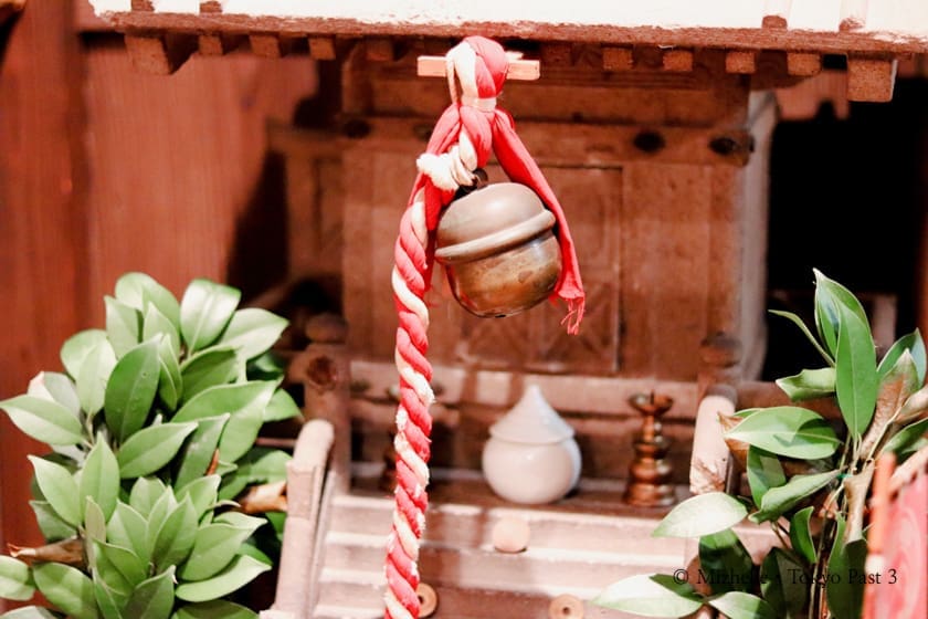 A bell at a makeshift shrine inside Shitamachi Museum