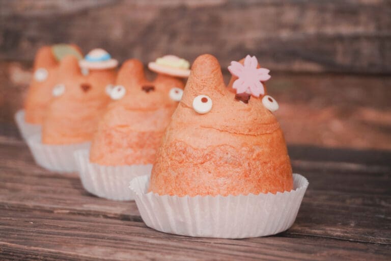 Totoro Cream Puffs lined up on a bench at Inokashira Park