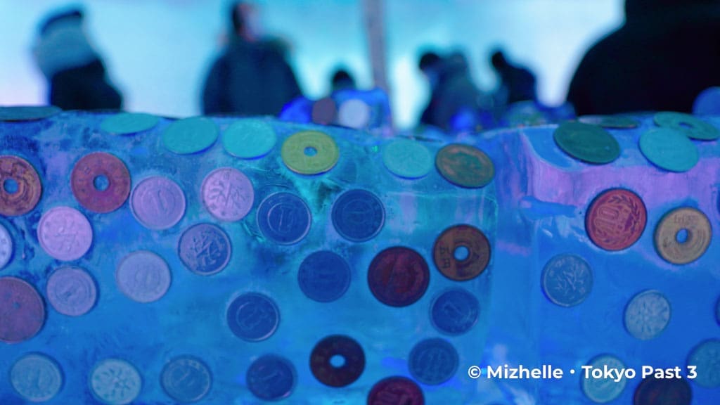 Coins at Hyoto Shrine